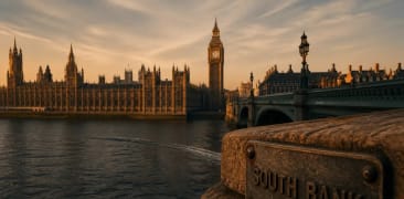 The Palace of Westminster and Big Ben along the Thames at sunset, seen from the South Bank